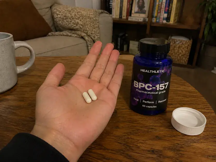 bpc157 capsule hand photo